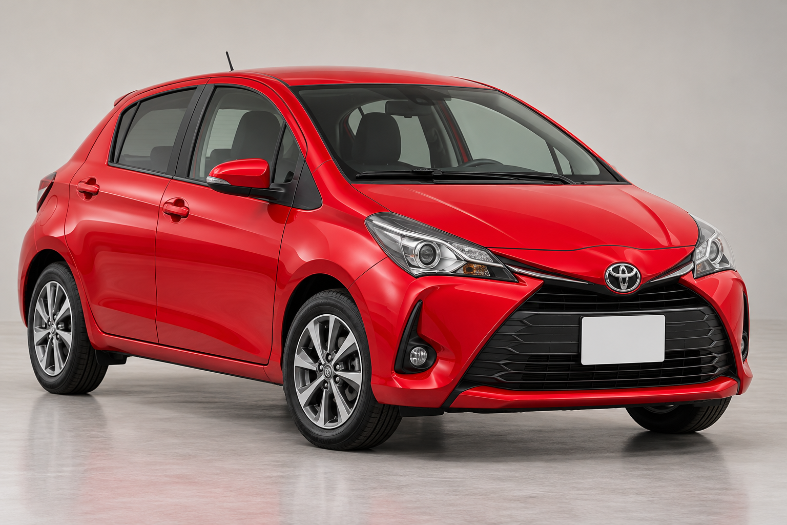 Red Toyota hatchback